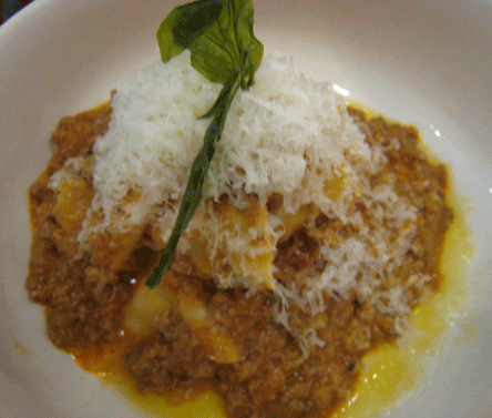 Papardelle with sauce Bolognese and fried basil