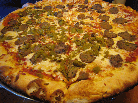 The Queens Pizza (Homemade Meatballs and Mozzarella), half with green chile