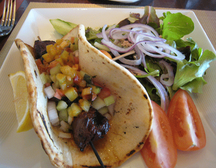 Lucia08 Moroccan Pita: spiced beef & black mission fig kabob with cucumber relish, harissa & a Greek salad
