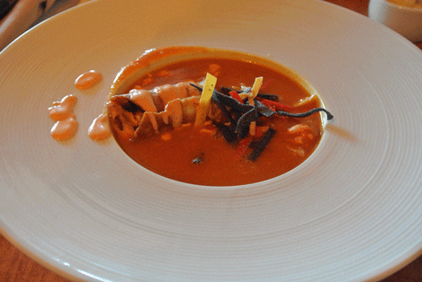 Taquito Soup (Tomato Broth, Avocado, Charred Corn, Pulled Chicken, Cheese Taquito, Crema