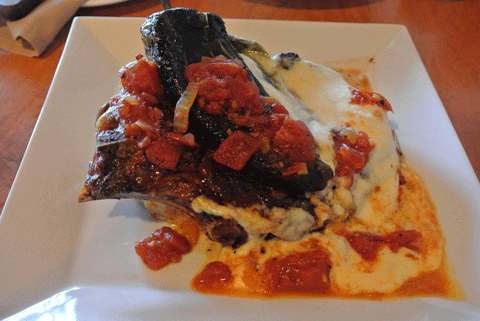 Bone-In Center-Cut Rib Eye (16-ounce hand-cut bone-in rib eye, chile relleno, charred tomato sauce, mashed potatoes