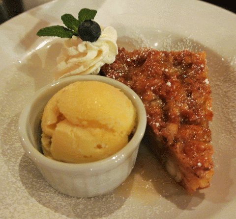 White Chocolate Macadamia Bread Pudding with Vanilla Ice Cream