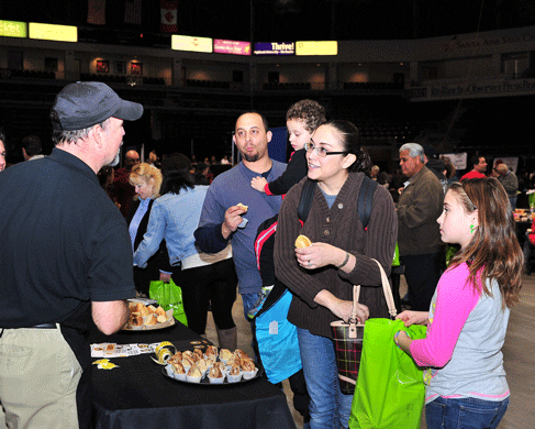Long-time Rio Rancho Restaurateur Gary West Greets Guests at the Einstein Bagels Booth